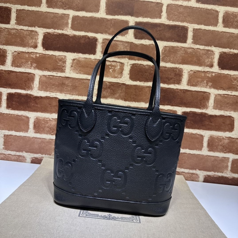 G*u*i shopping bags